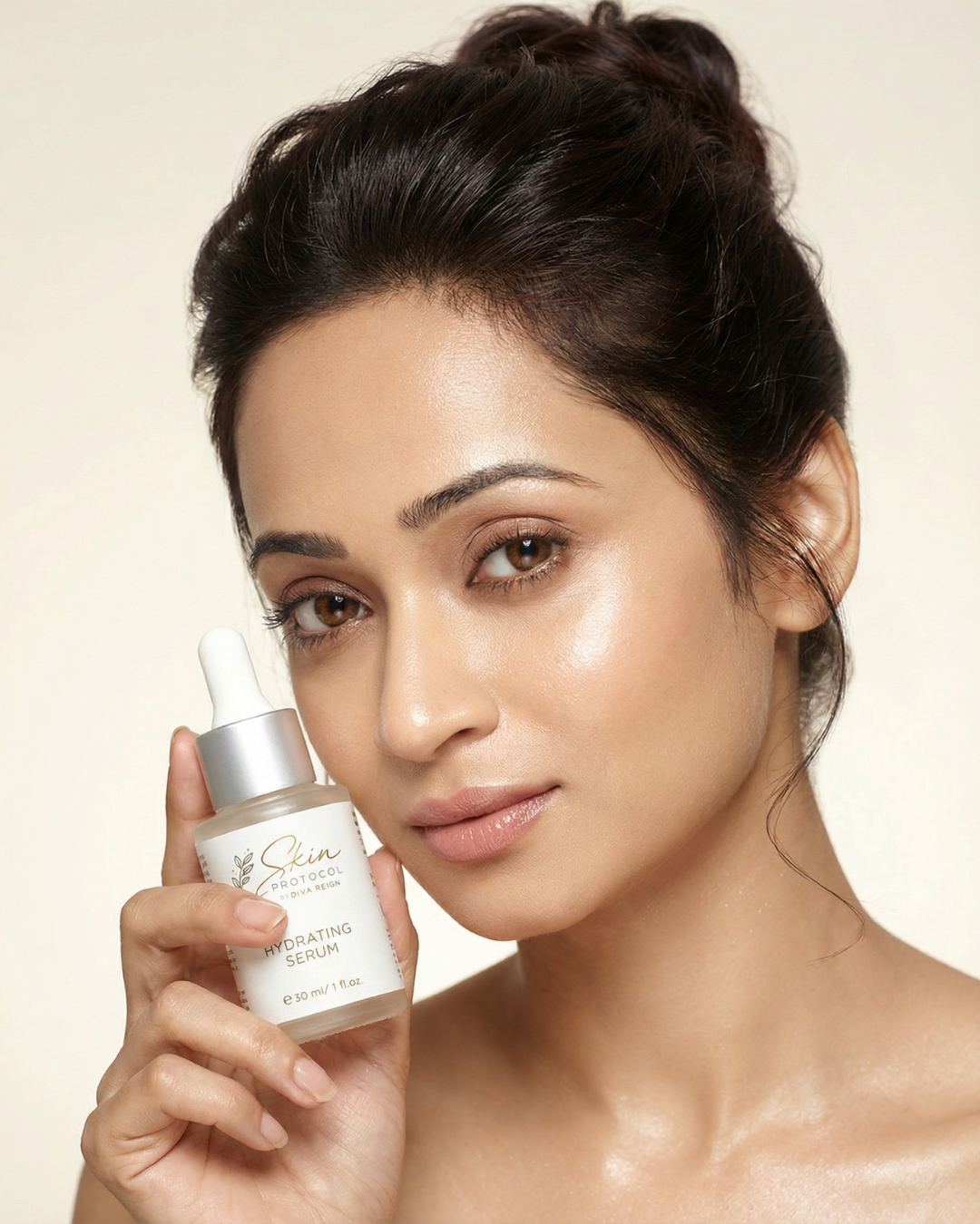 Woman holding Skin Protocol hydrating serum